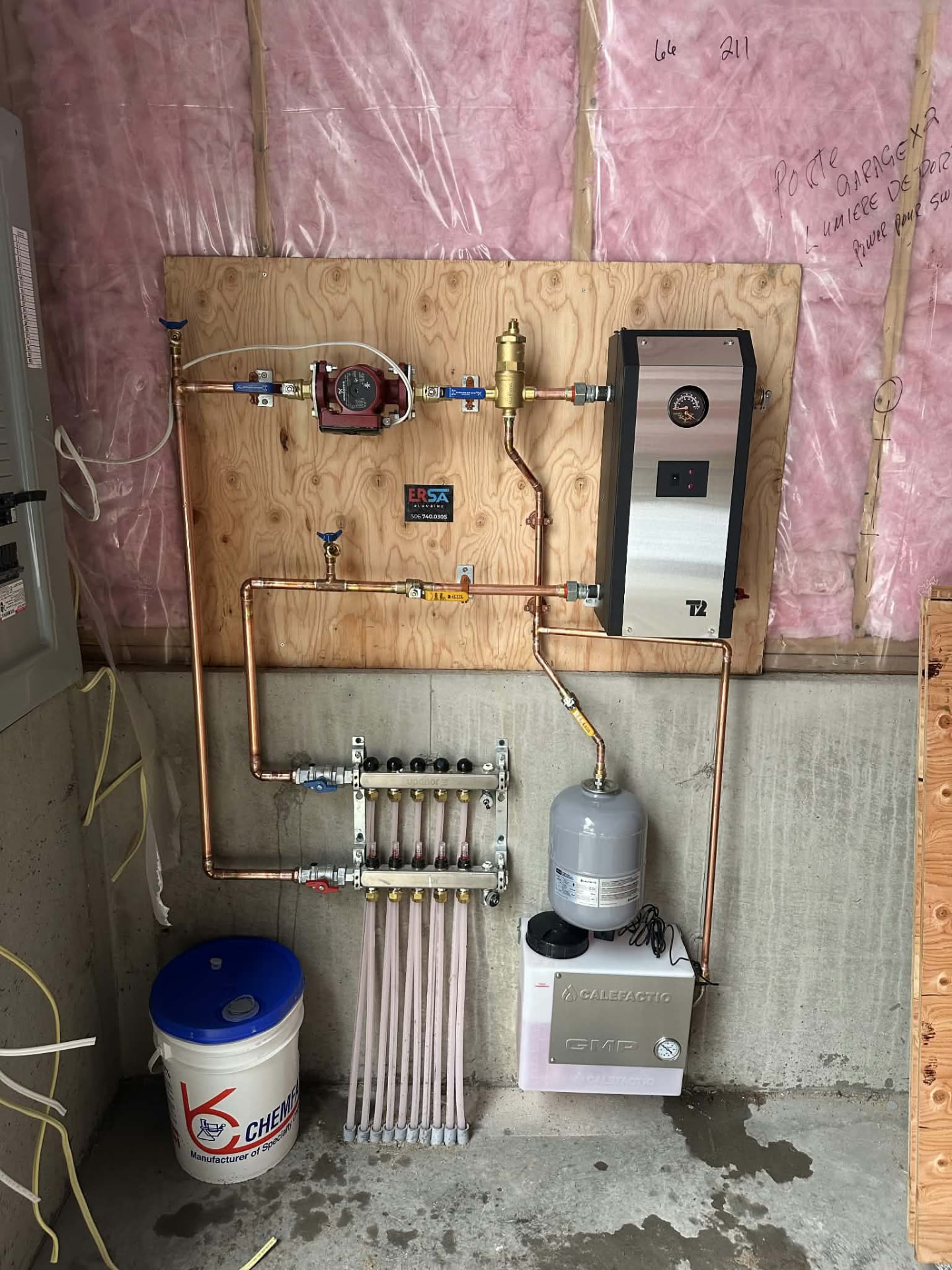 Completed radiant heating manifold and mechanical system installation