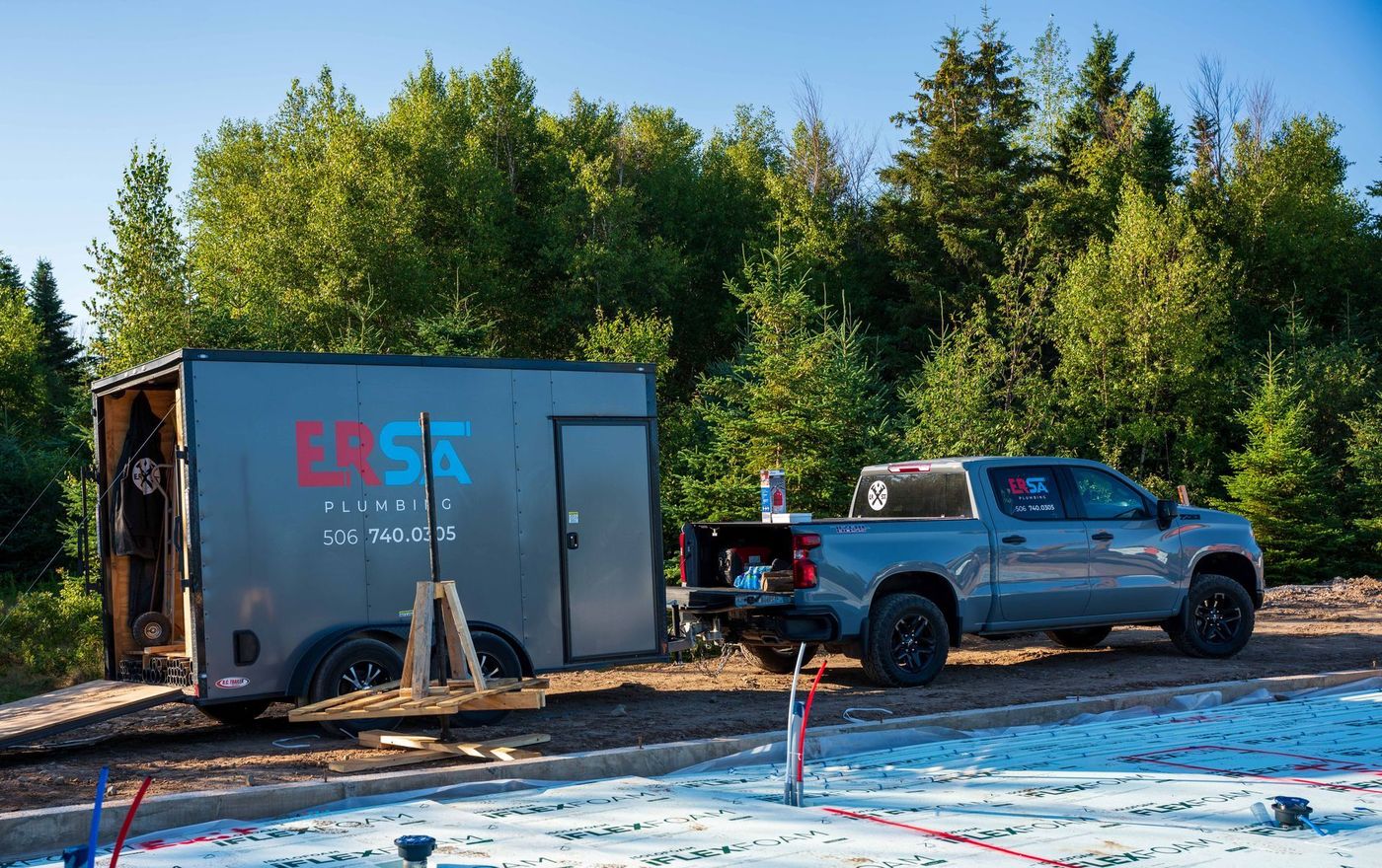 ERSA Plumbing crew installing underground and under-slab plumbing on a new construction site