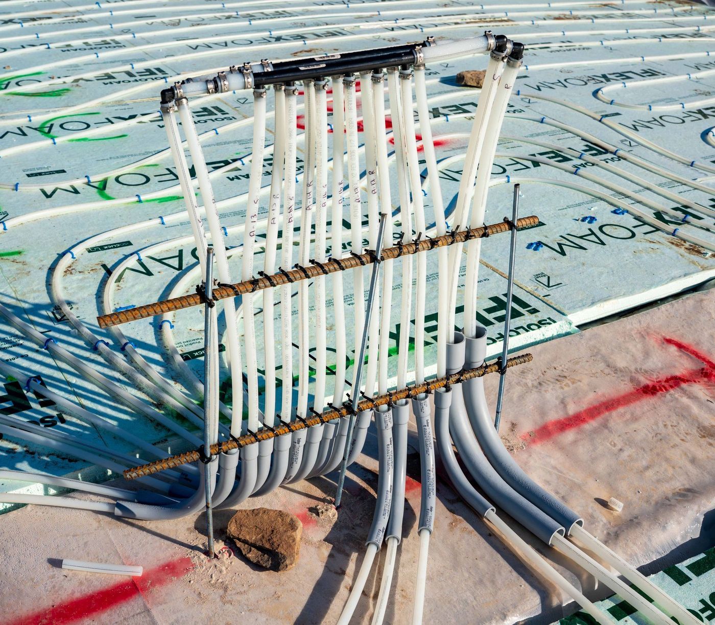 ERSA Plumbing crew installing underground and under-slab plumbing on a new construction site