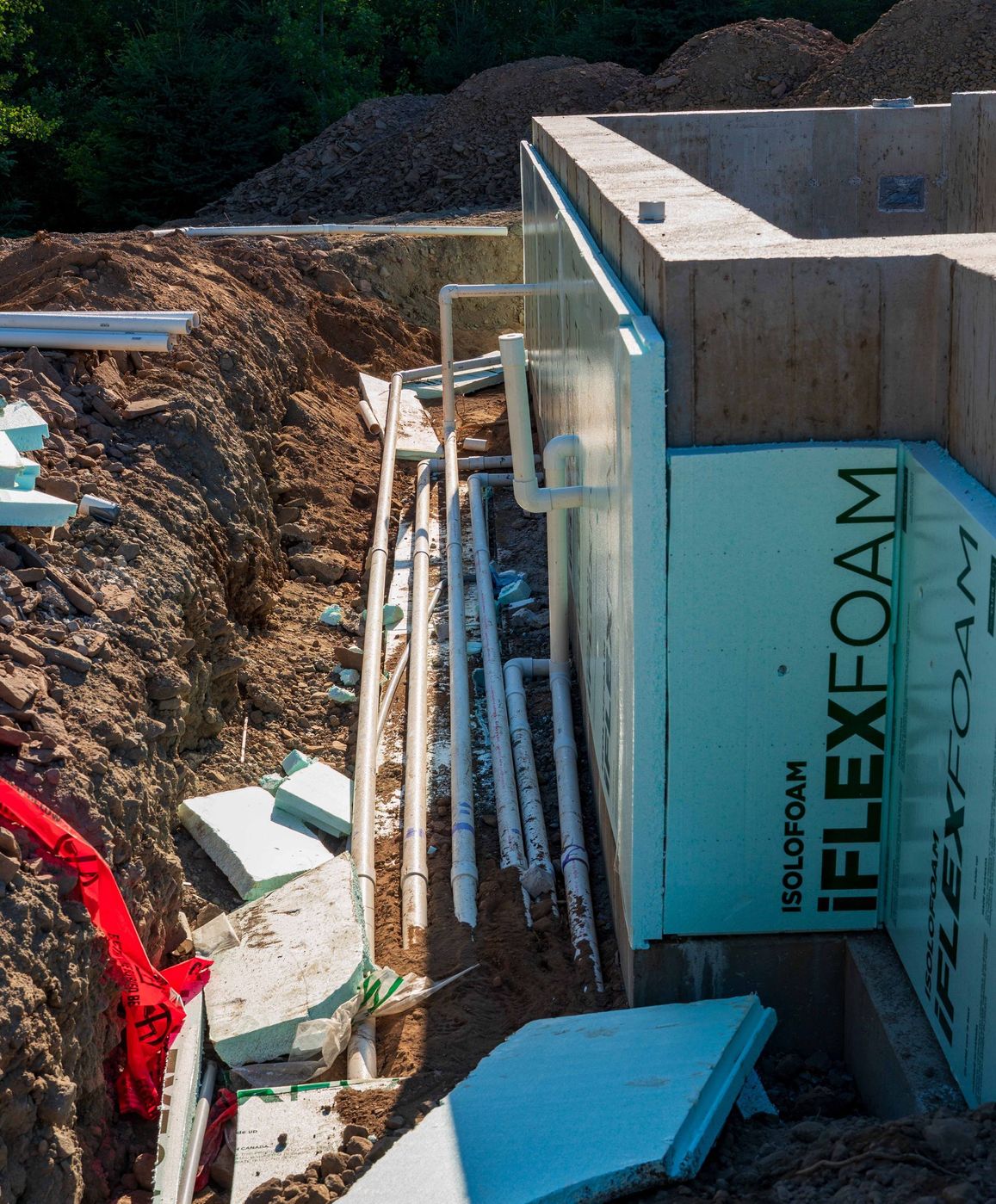 ERSA Plumbing crew installing underground and under-slab plumbing on a new construction site