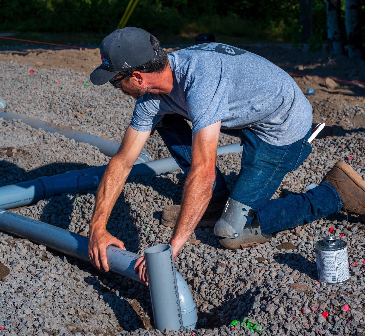 ERSA Plumbing crew installing underground and under-slab plumbing on a new construction site