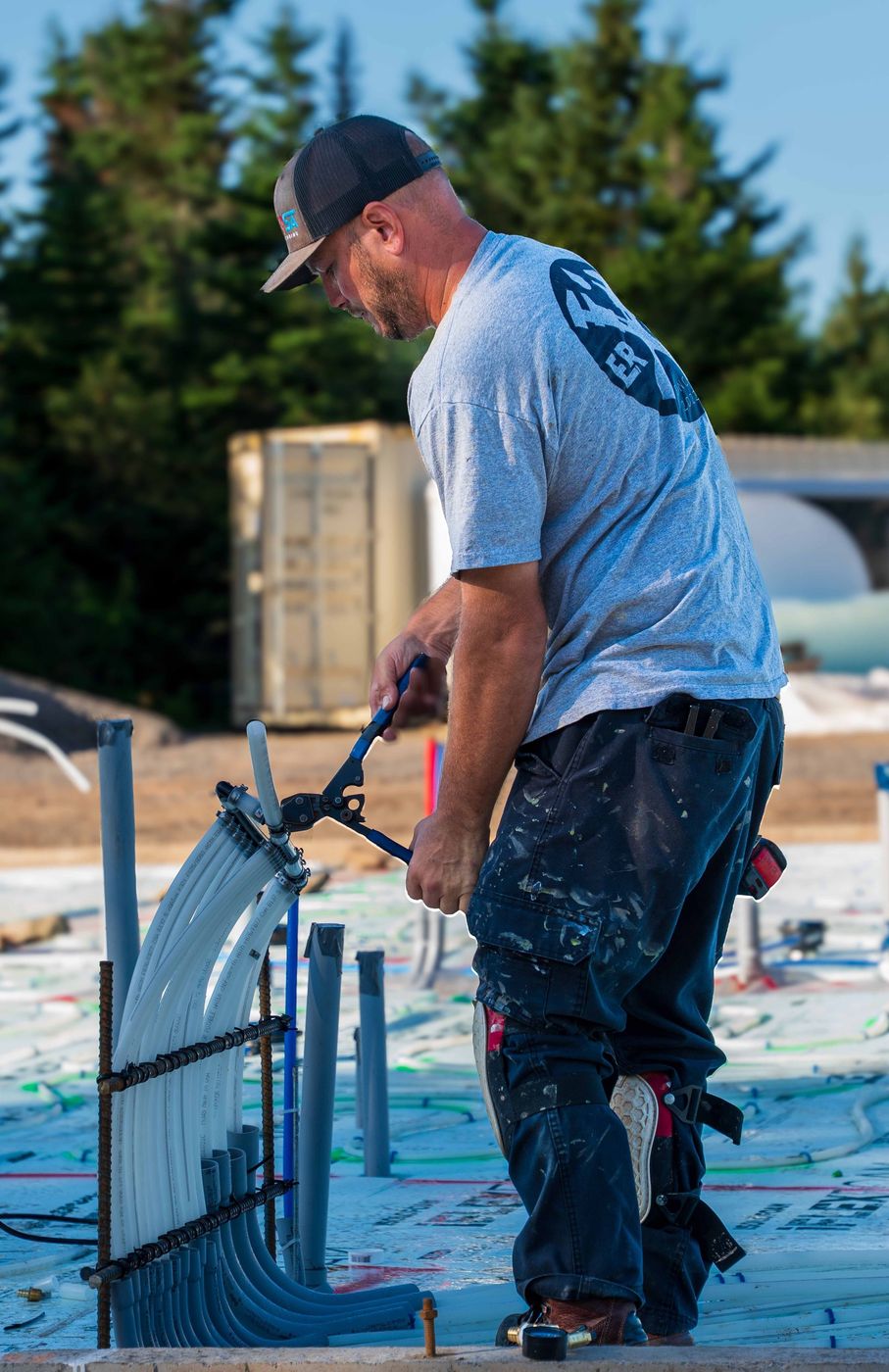 ERSA Plumbing crew installing underground and under-slab plumbing on a new construction site